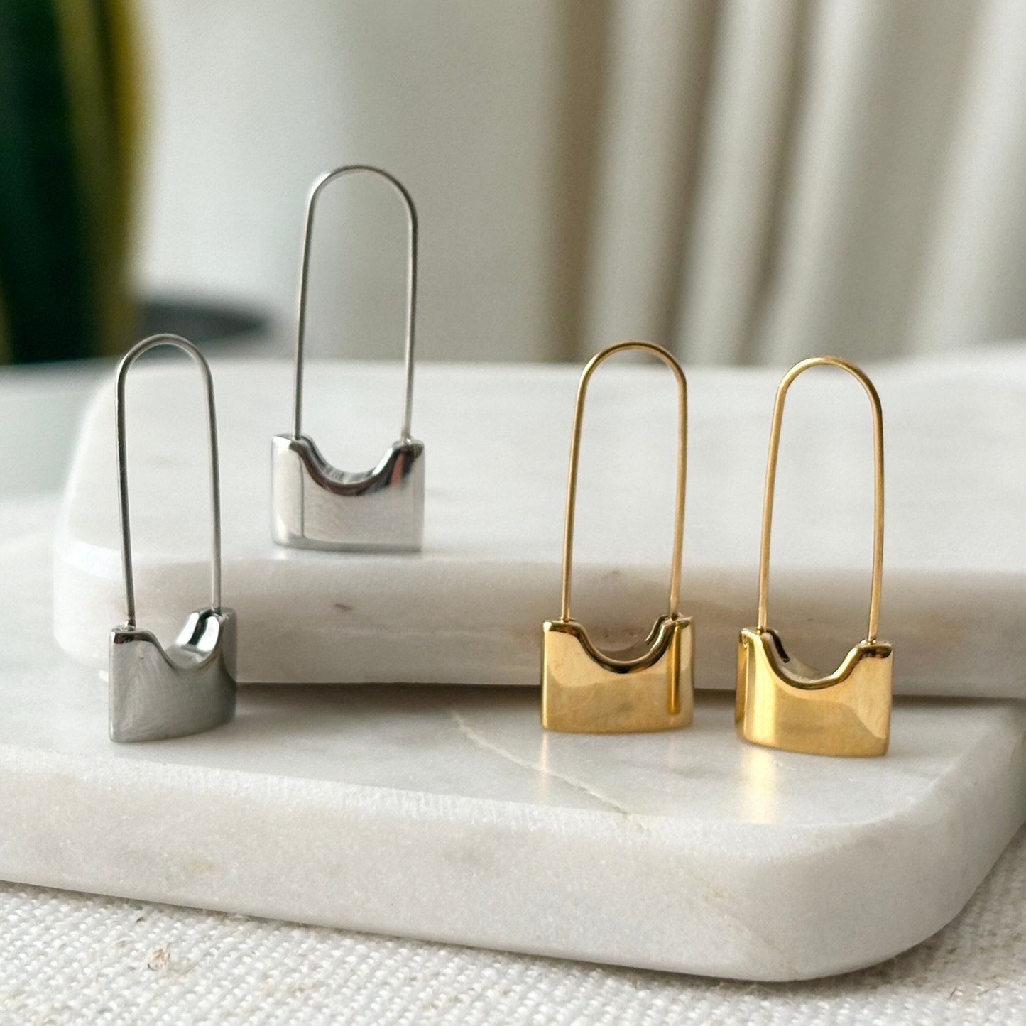 LOCKED-IN EARRINGS